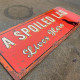 A spoiled Lab Lives Here -  Metal Wall Sign