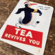 Tea Revives You Keep Your Tail Up Penguin - Metal Propaganda Wall Sign